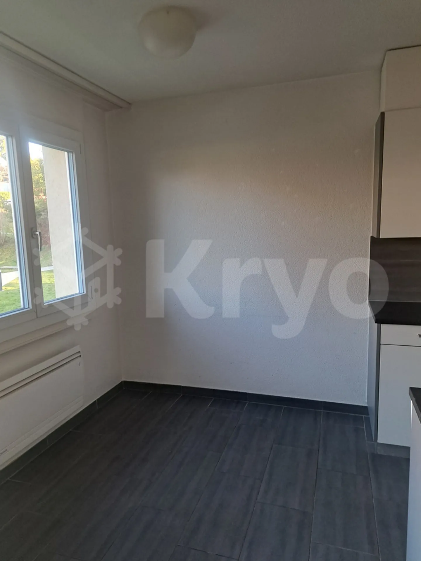 Appartement au Rez-de-Chaussée - Photo 2 sur 6