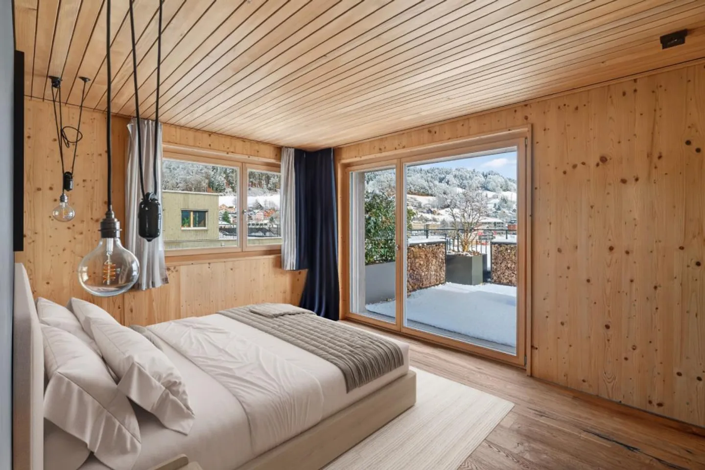 Exclusive penthouse apartment in modern wooden construction with beautiful panoramic view - Photo 6 of 13