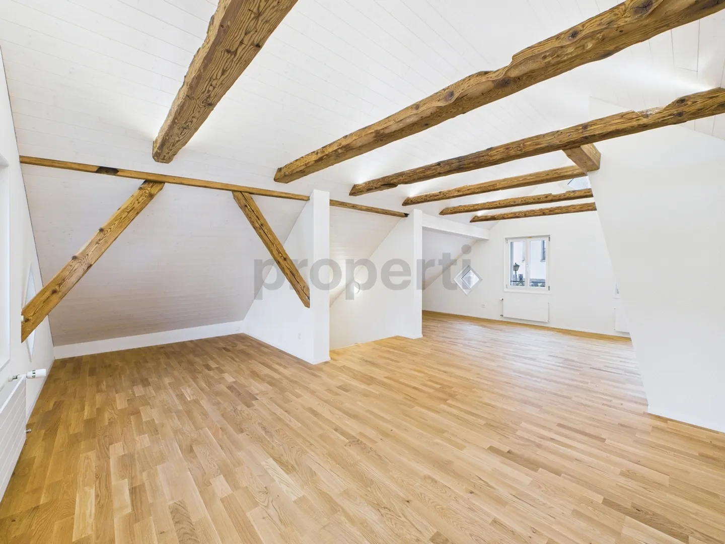Appartamento duplex ristrutturato di 3,5 locali in una posizione fiscalmente favorevole - Foto 1 di 12