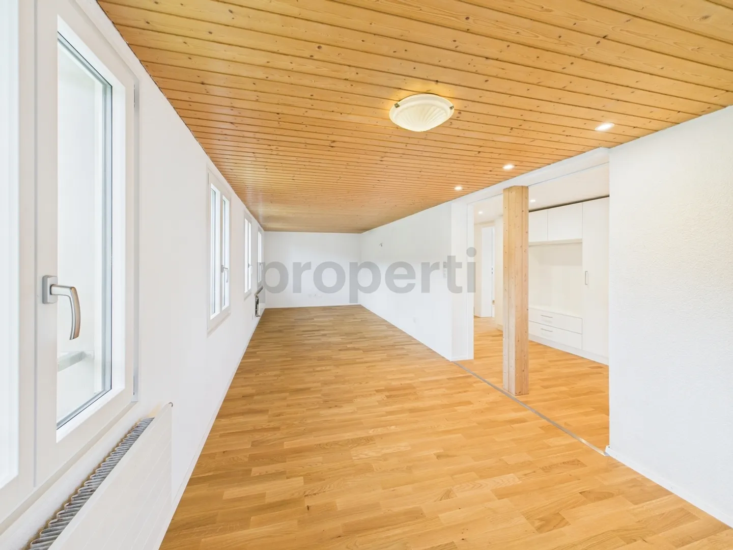 Appartamento duplex ristrutturato di 3,5 locali in una posizione fiscalmente favorevole - Foto 7 di 12