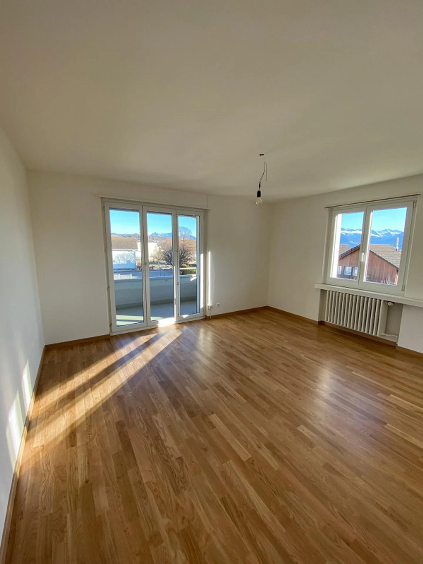 Cozy 4-Room Apartment with Balconies - Photo 2 of 7