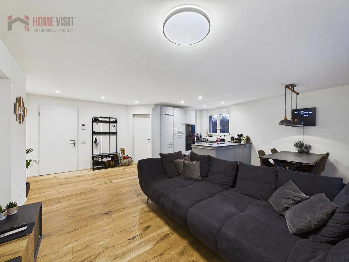 Exklusive 3.5-Zimmer-Gartenwohnung mit beheiztem Hobbyraum - Foto 1 von 14