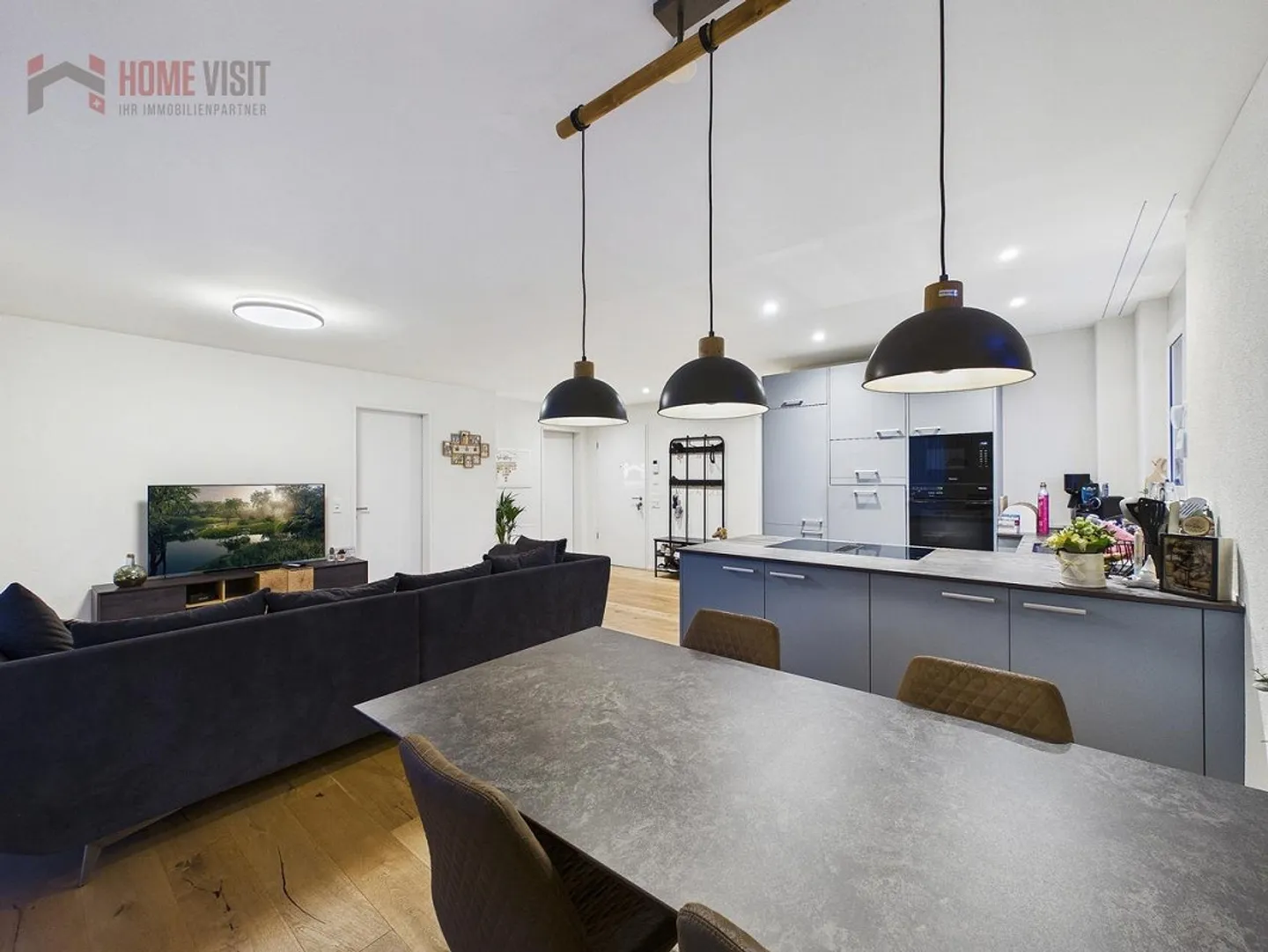 Exklusive 3.5-Zimmer-Gartenwohnung mit beheiztem Hobbyraum - Foto 2 von 14