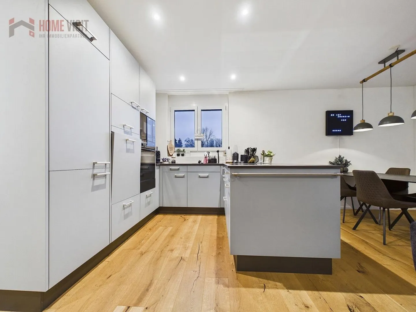 Exklusive 3.5-Zimmer-Gartenwohnung mit beheiztem Hobbyraum - Foto 6 von 14