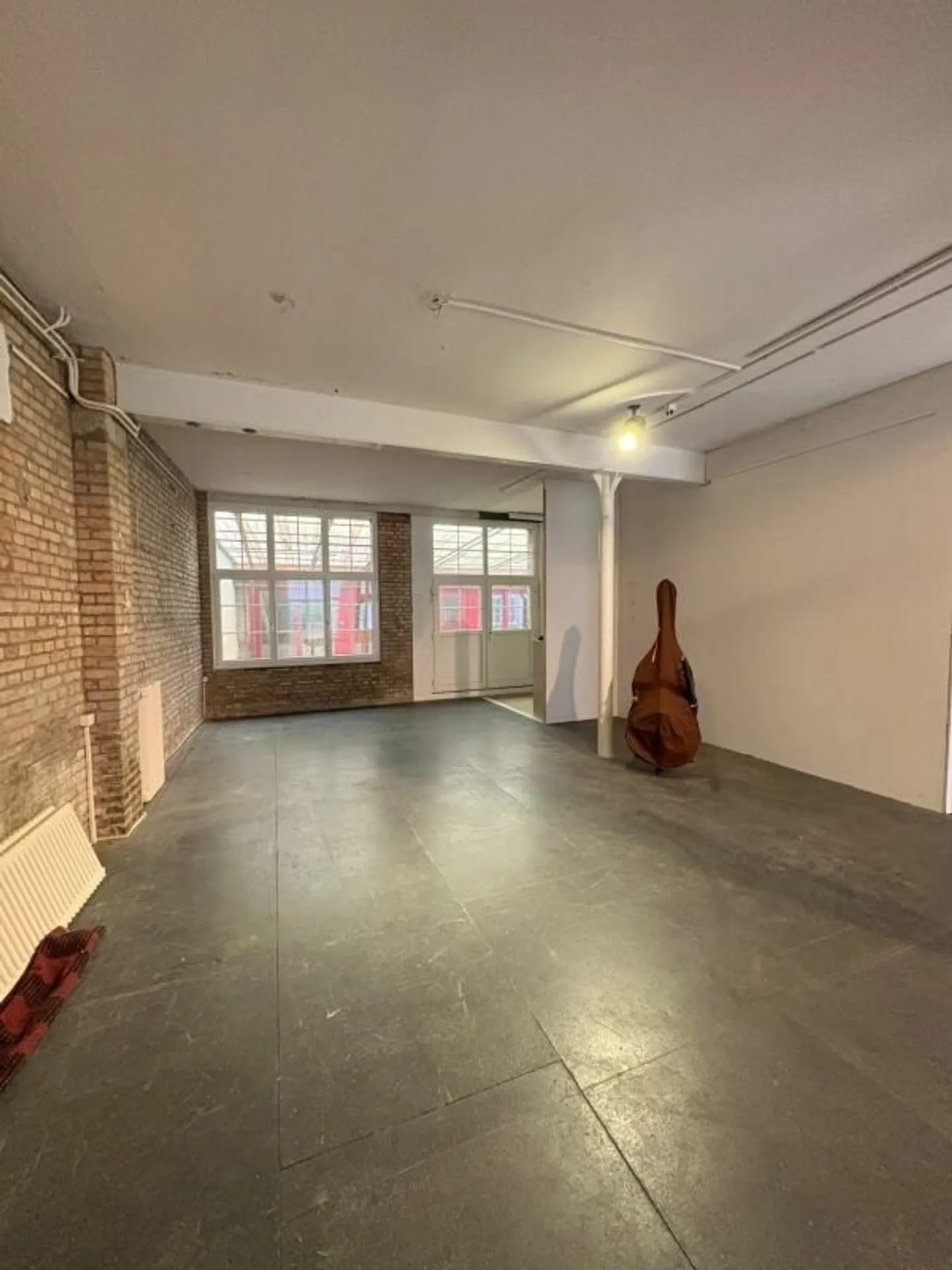 Spacious area on two floors + covered outdoor area & storage space copy - Photo 2 of 14