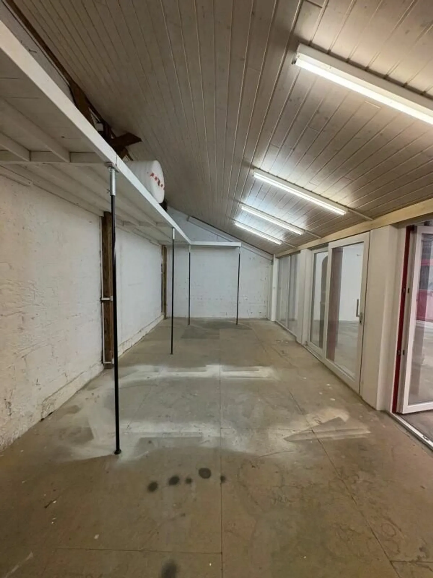 Spacious area on two floors + covered outdoor area & storage space copy - Photo 7 of 14