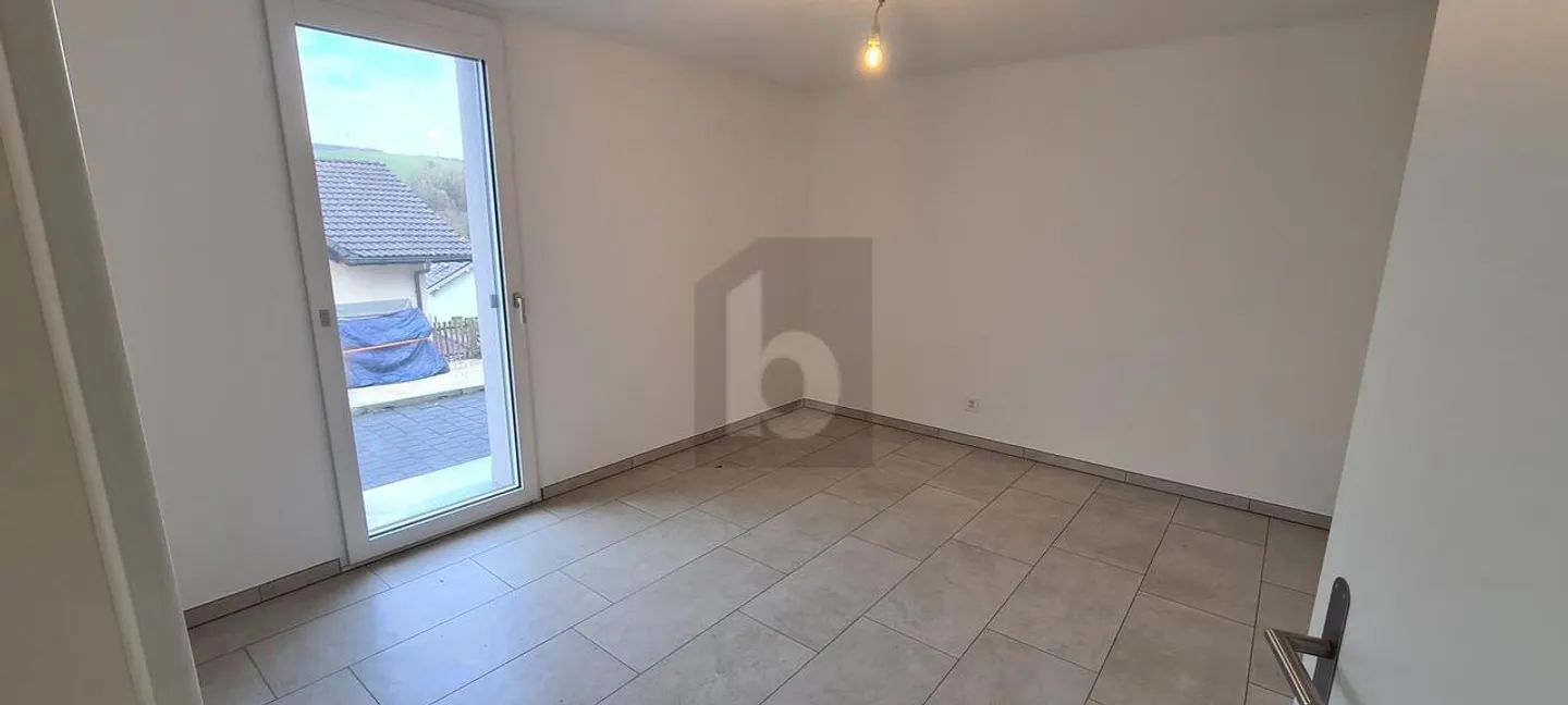 Appartement spacieux au rez-de-chaussée - Photo 3 sur 5