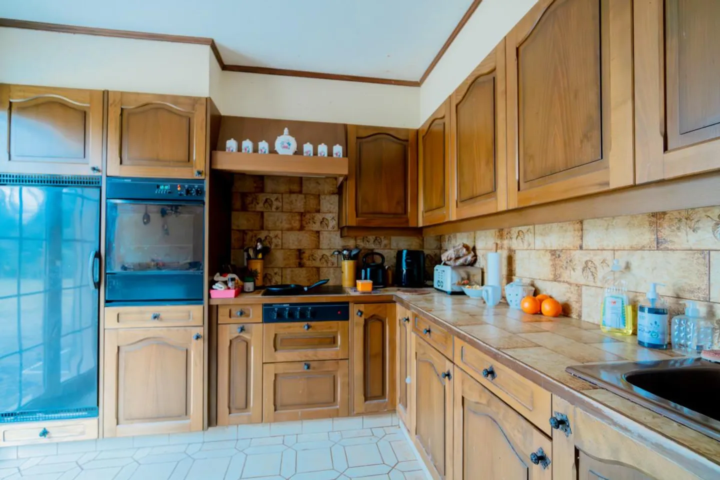 Familienhaus mit außergewöhnlichem Garten - Foto 2 von 10