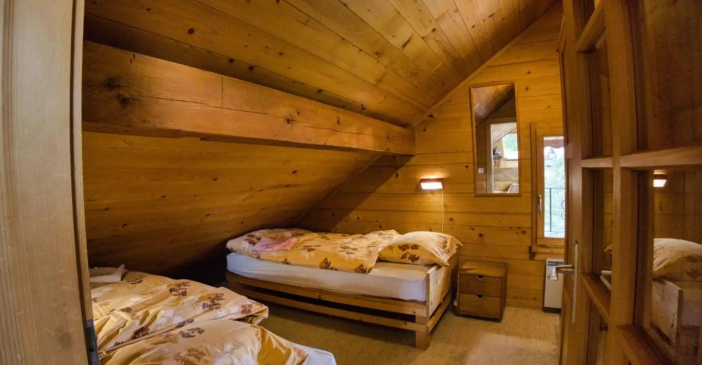 Eine gemütliche 3-Zimmer-Wohnung unter dem Dach im Herzen von Château-d'Oex - Foto 5 von 12