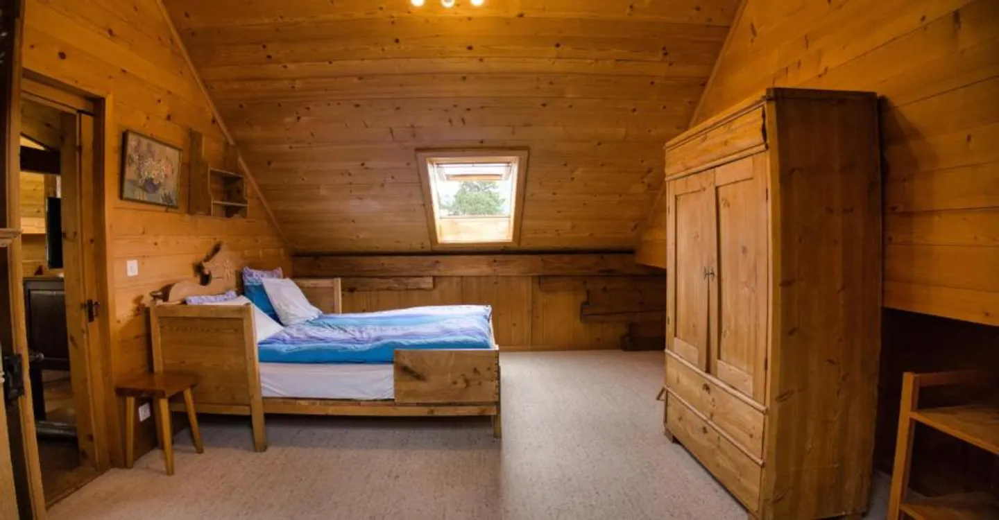 Eine gemütliche 3-Zimmer-Wohnung unter dem Dach im Herzen von Château-d'Oex - Foto 8 von 12