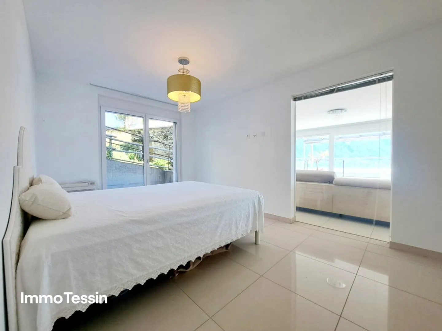 EVIDENZA: Appartamento spettacolare con piscina privata, enorme terrazza e vista mozzafiato sul Lago Maggiore - Foto 11 di 13