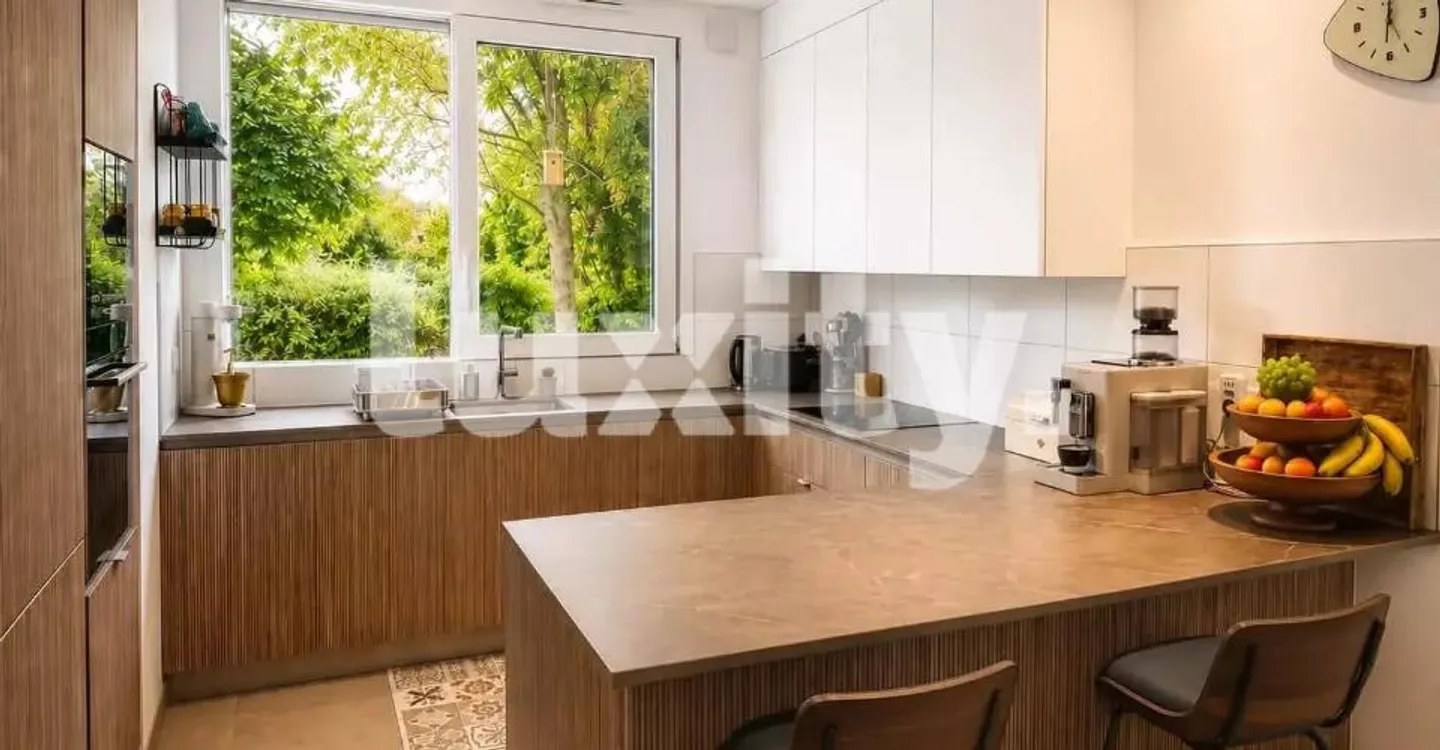 Zeitgemässes Familienhaus mit Garten - Foto 3 von 3