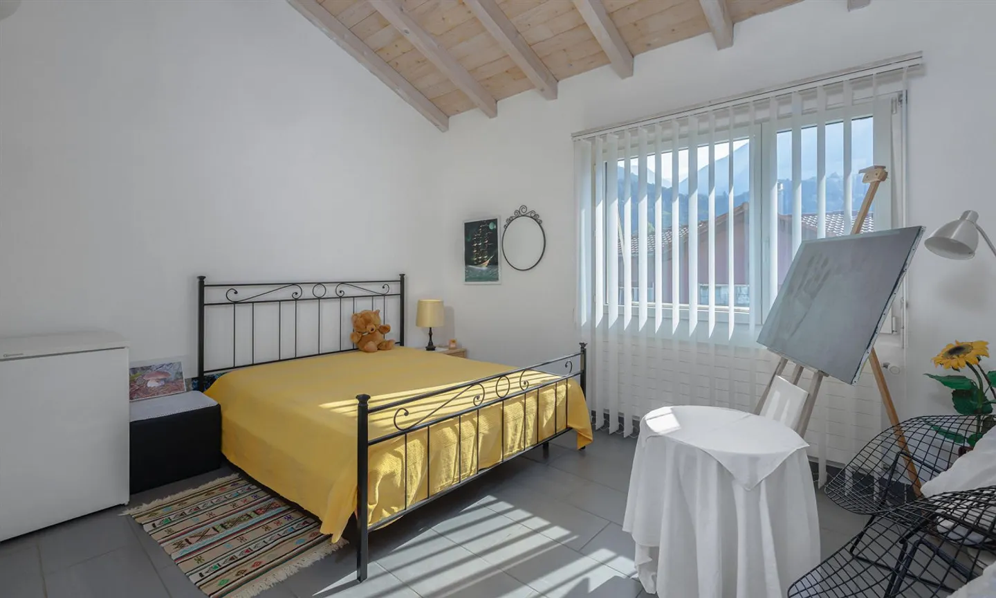 GERÄUMIGES ZWEIFAMILIENHAUS MIT GARTEN UND GROTTO IN GIUBIASCO - Foto 6 von 9