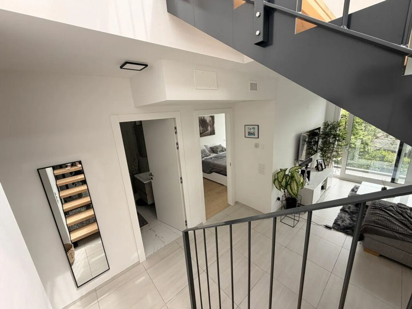 AGNO · APPARTEMENT SPACIEUX ET MODERNE DE DEUX PIÈCES AVEC TERRASSE PANORAMIQUE - Photo 7 sur 12