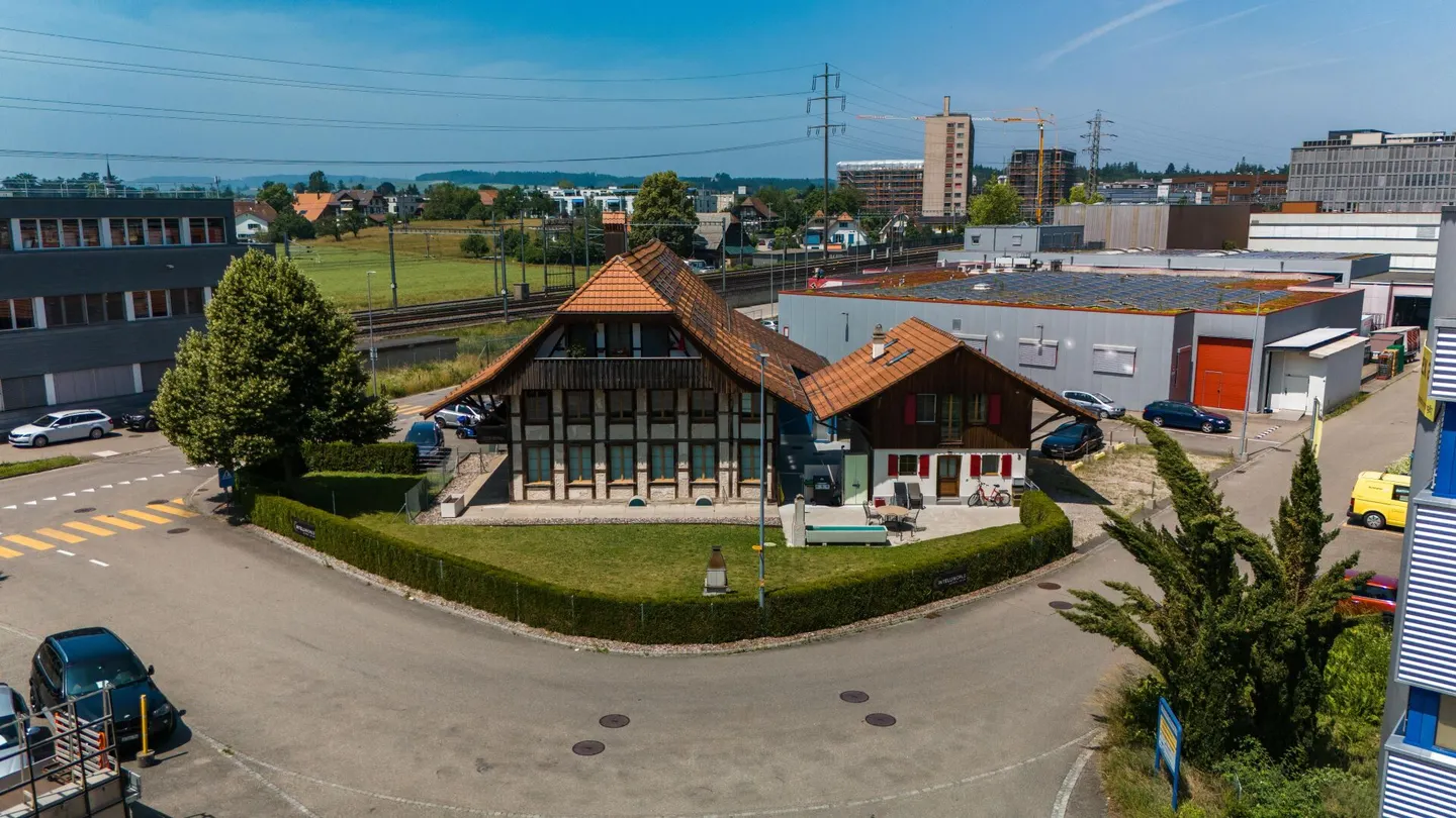 Fully rented residential and commercial building in Zollikofen - Photo 1 of 8