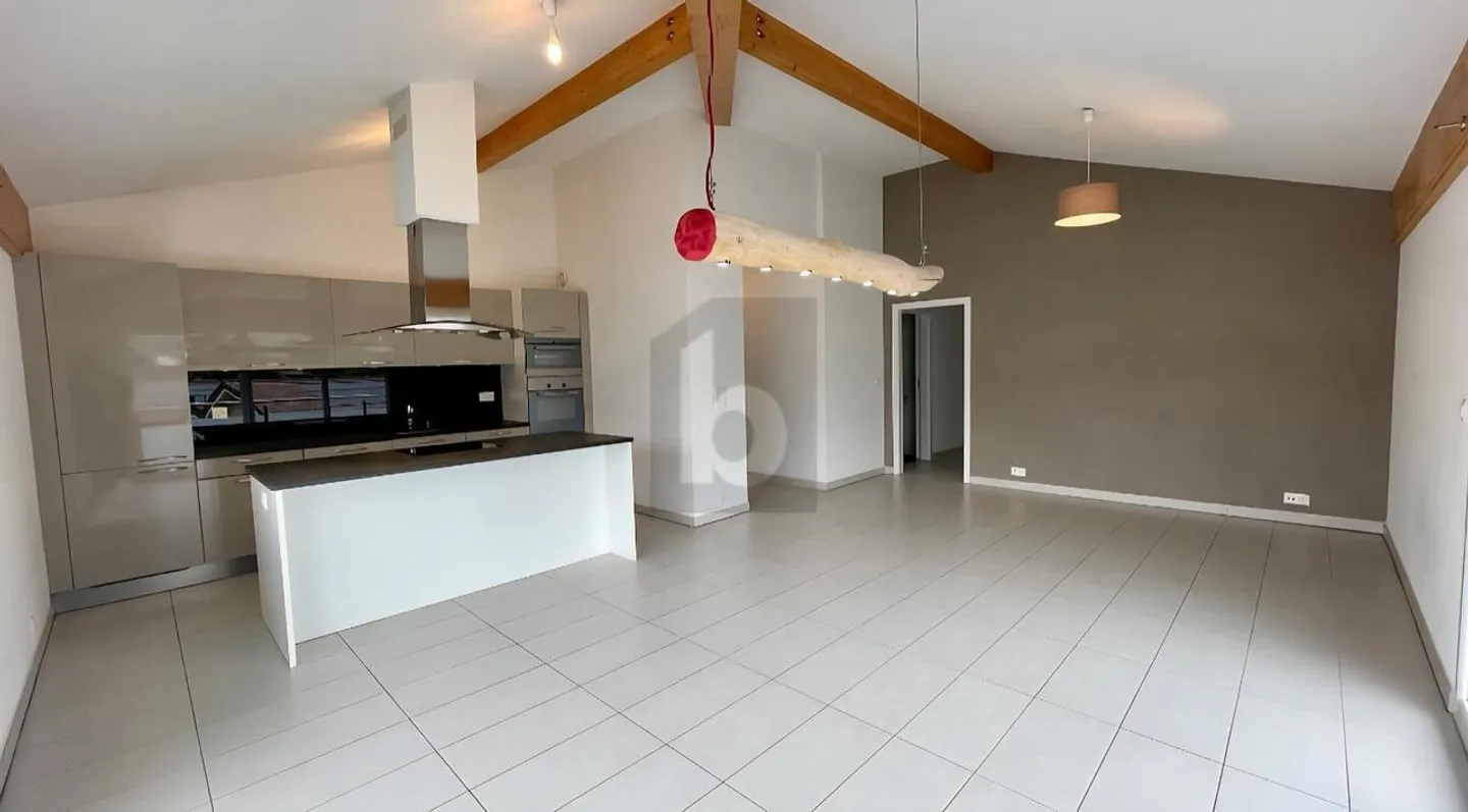 Appartement Attique Charmant à Aigle - Photo 2 sur 6