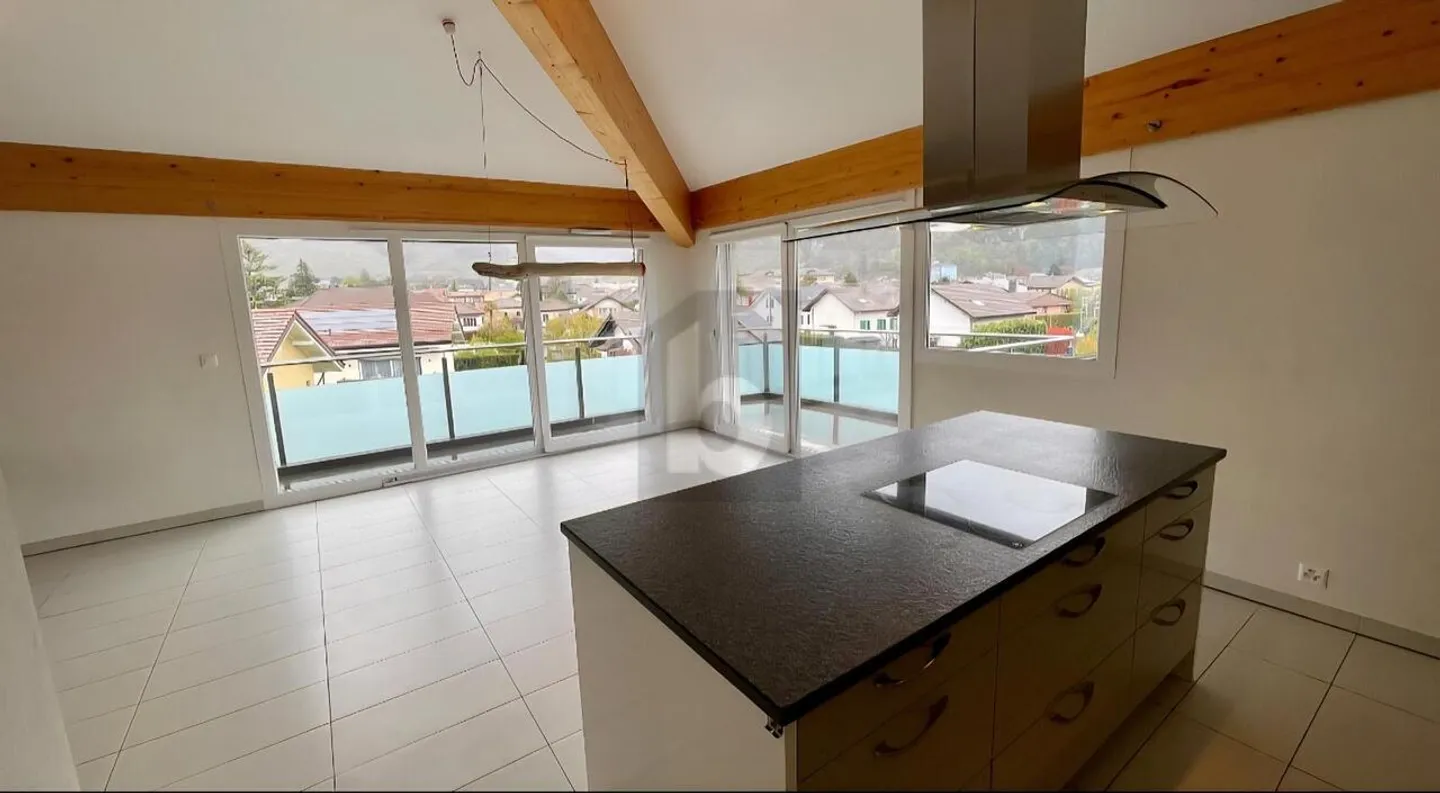 Appartement Attique Charmant à Aigle - Photo 3 sur 6