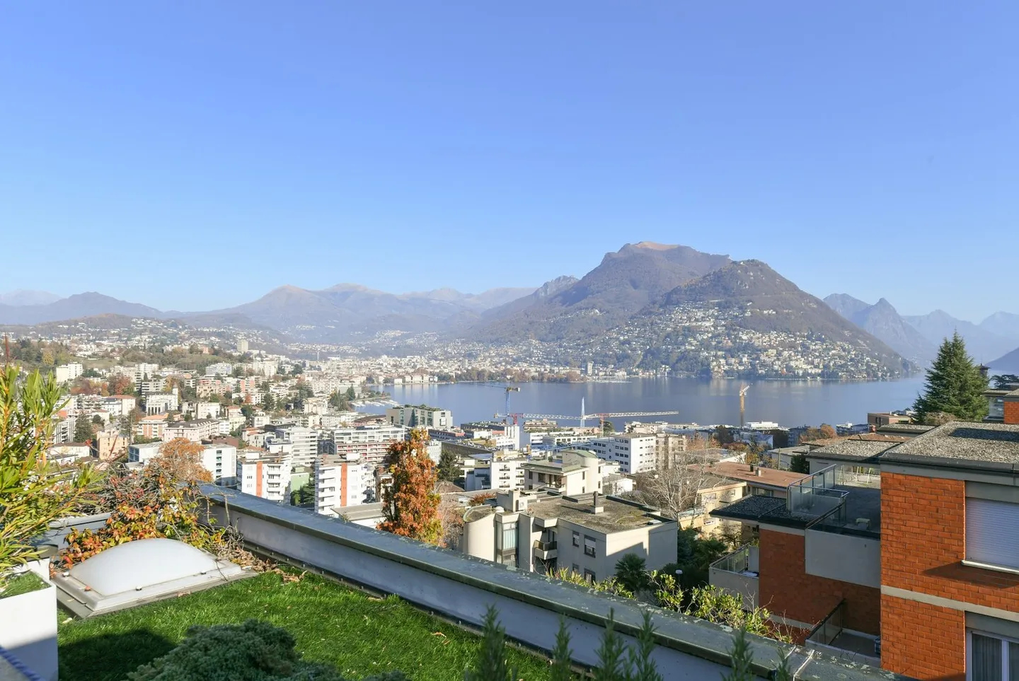 Penthouse à Paradiso avec vue sur le lac à 360° et grande terrasse - Photo 1 sur 10