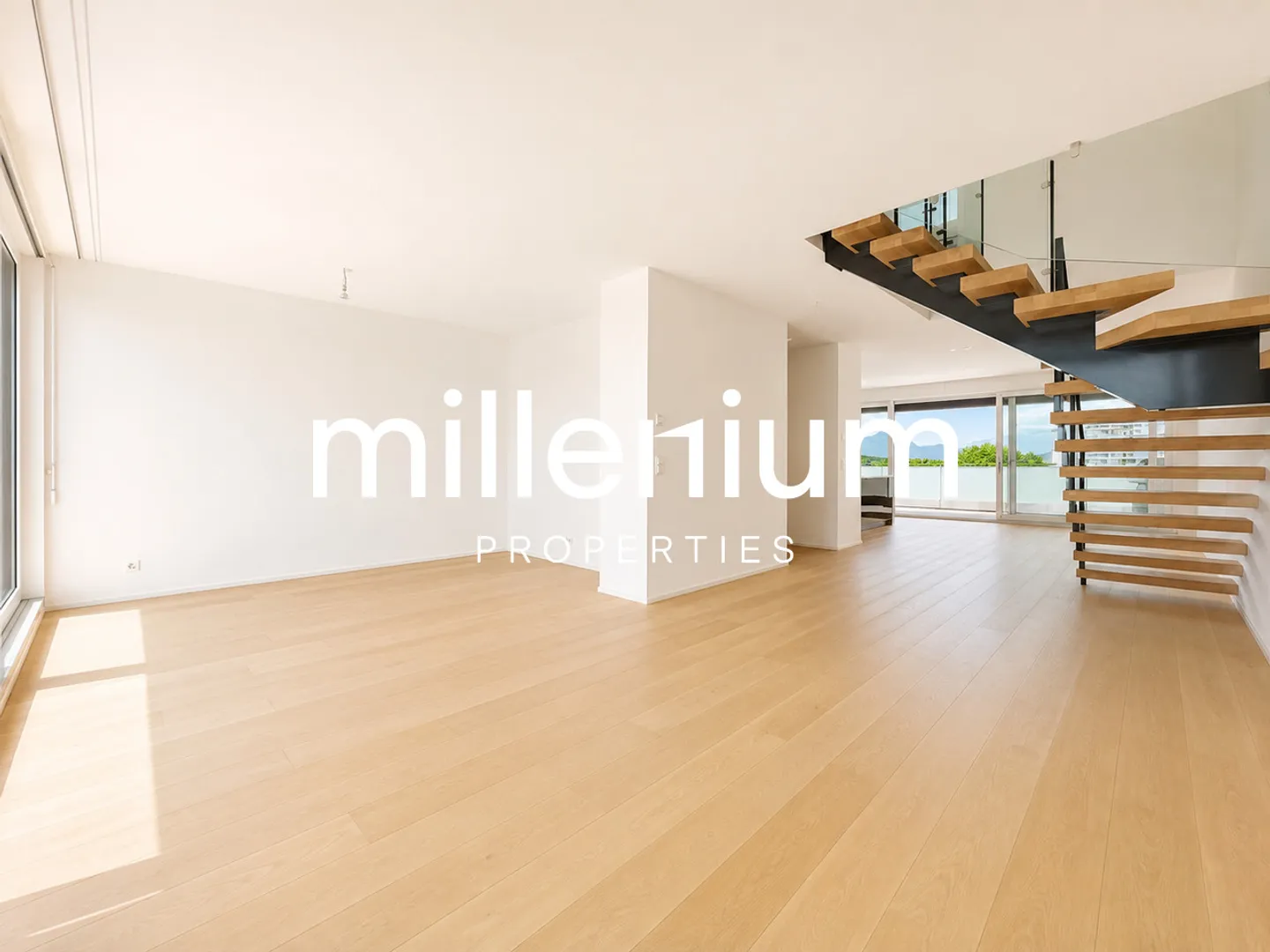 Magnifique duplex en attique avec vue sur le lac Léman et le Mont Blanc à Chêne-Bougeries - Photo 4 sur 15