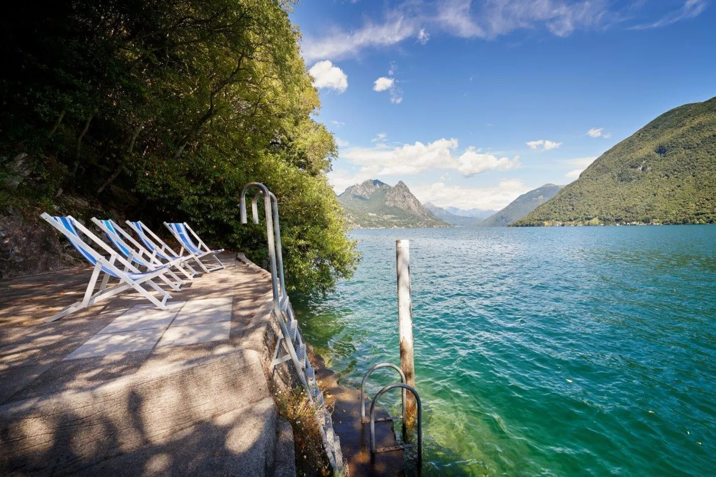 Einzigartige Gelegenheit: einkommensproduzierende Immobilie mit 7 Wohnungen am See mit privatem Zugang - Foto 3 von 4