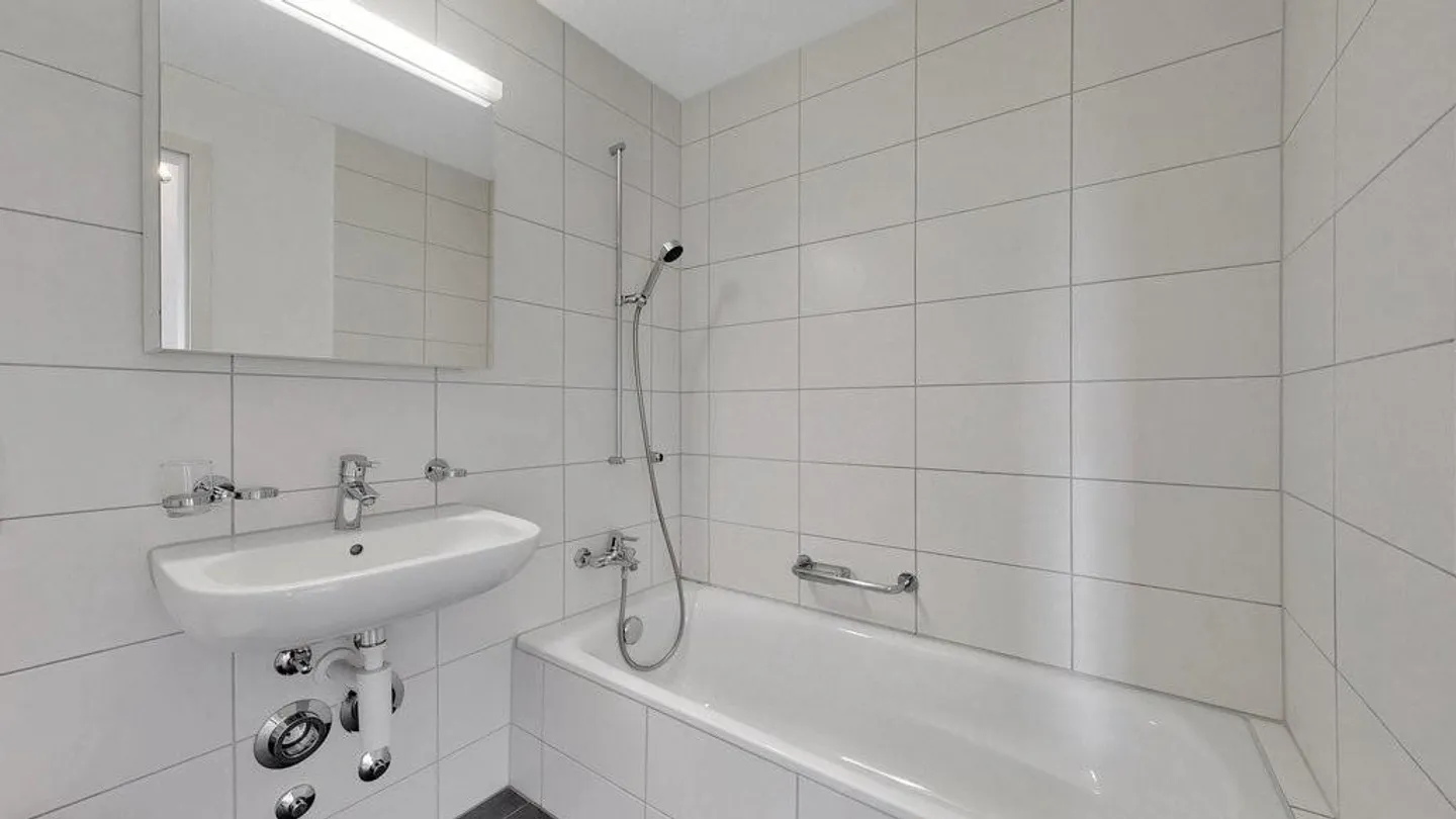 Charmante Attikawohnung mit Terrasse - Foto 4 von 9