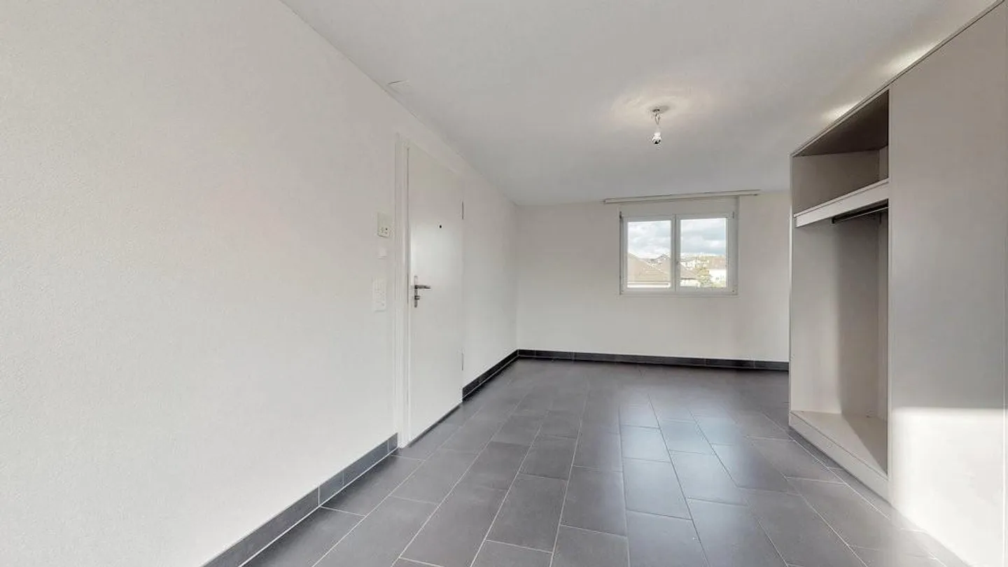 Charmante Attikawohnung mit Terrasse - Foto 6 von 9