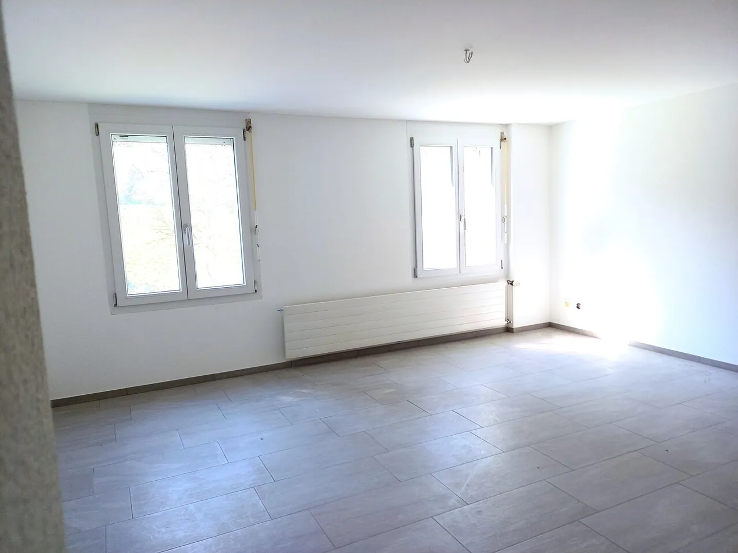 Appartement 3 pièces au rez-de-chaussée surélevé - Photo 3 sur 5