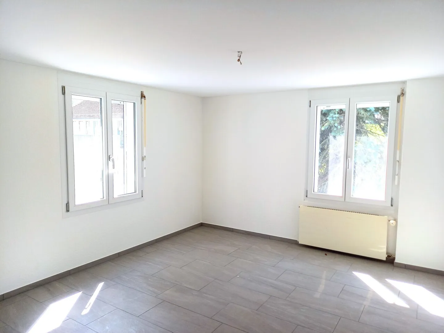 Appartement 3 pièces au rez-de-chaussée surélevé - Photo 4 sur 5