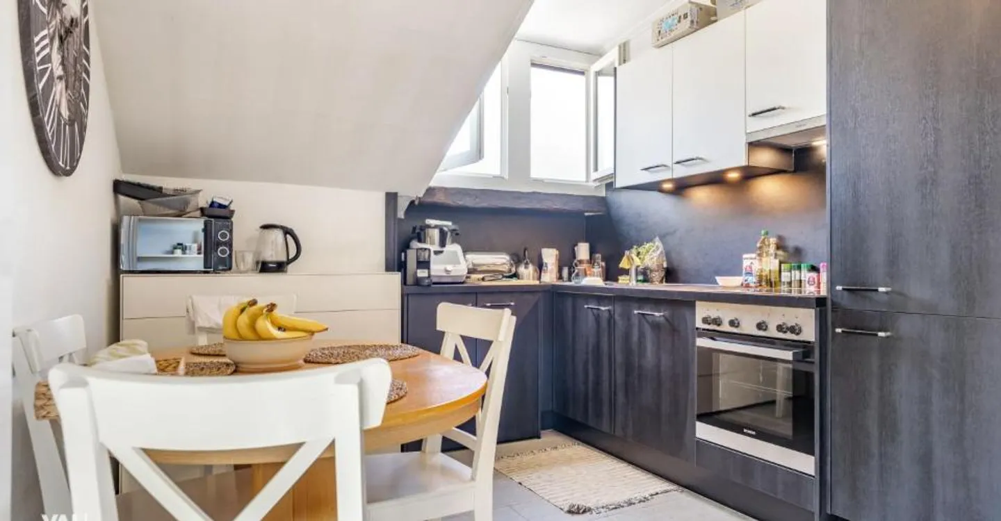 Appartement Charmant au Centre-Ville - Photo 1 sur 6