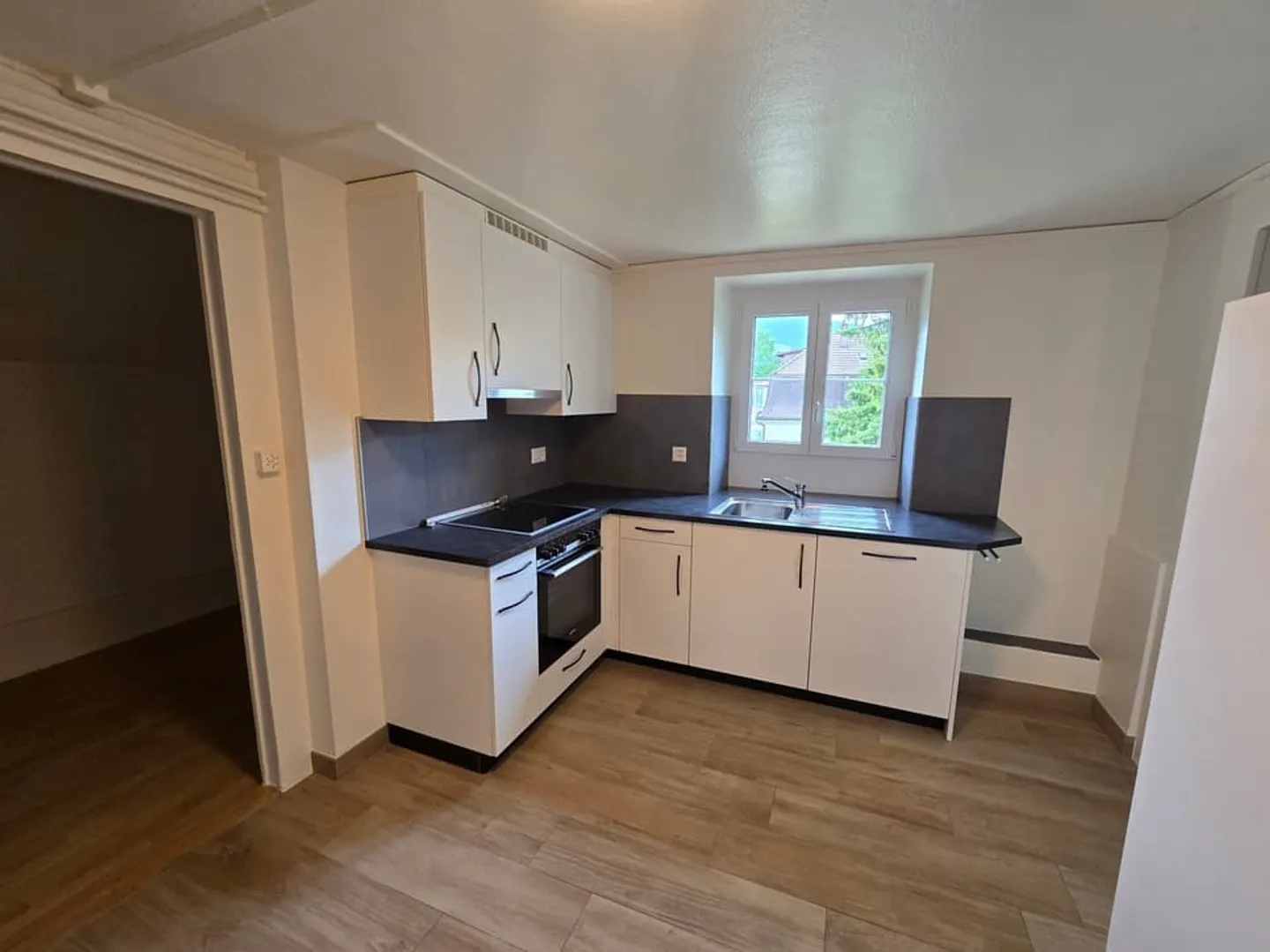 Joli appartement de 3 pièces au centre du village - Photo 1 sur 9