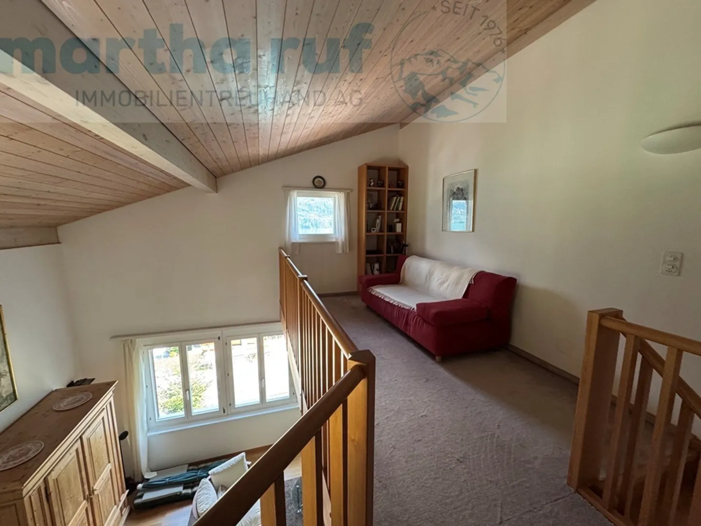 Spacious 2.5-room attic apartment with gallery and lake view - Photo 15 of 15