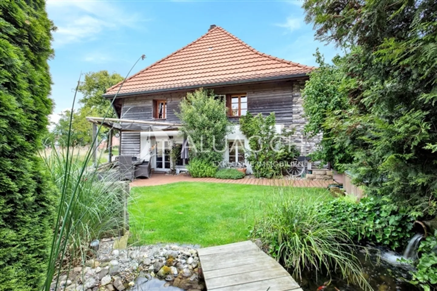 RENOVATED CUSTOM HOUSE AS IDYLLIC OASIS - Photo 1 of 16