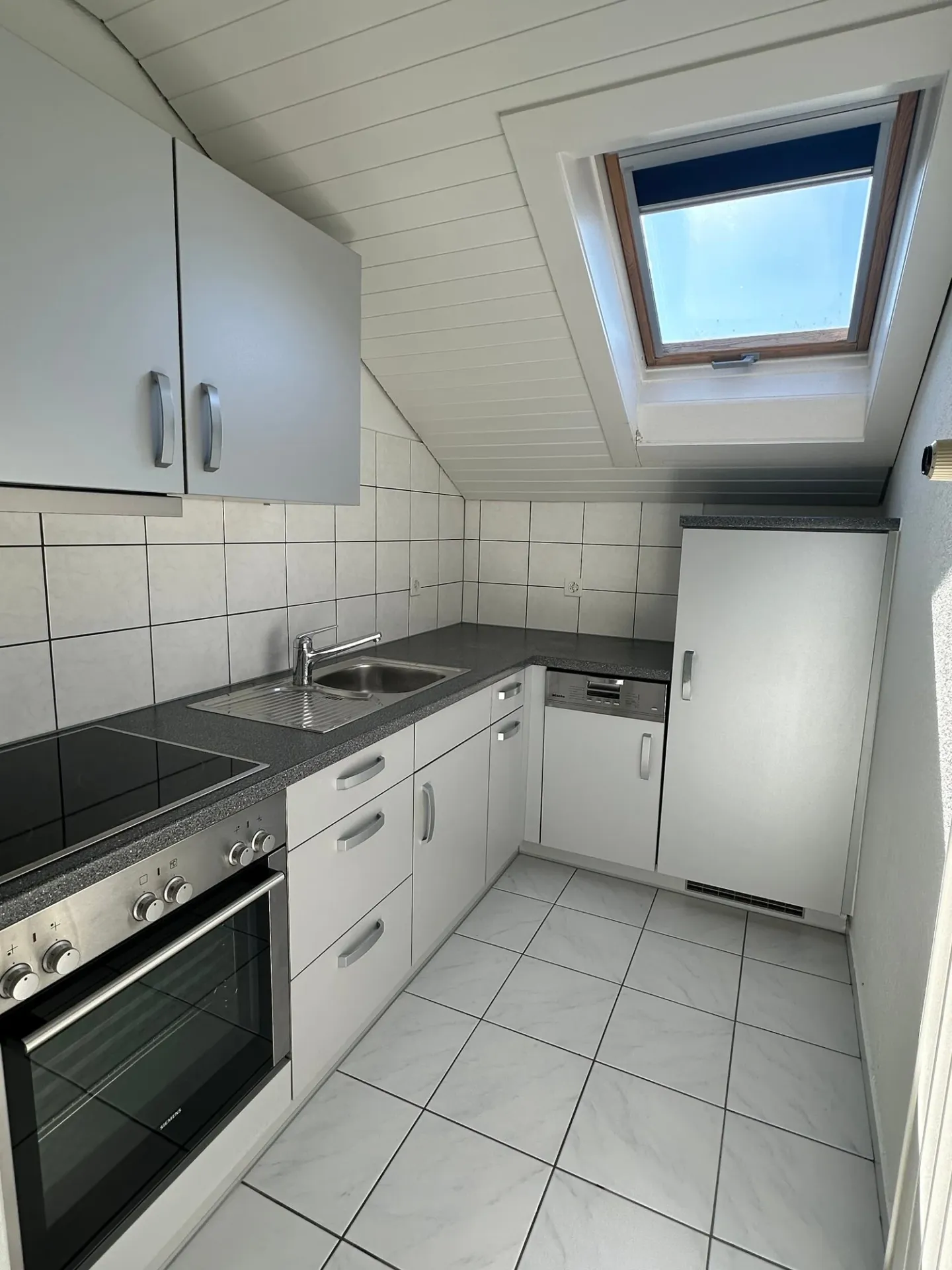 Geräumige Dachgeschosswohnung in Schwadernau - Foto 1 von 11