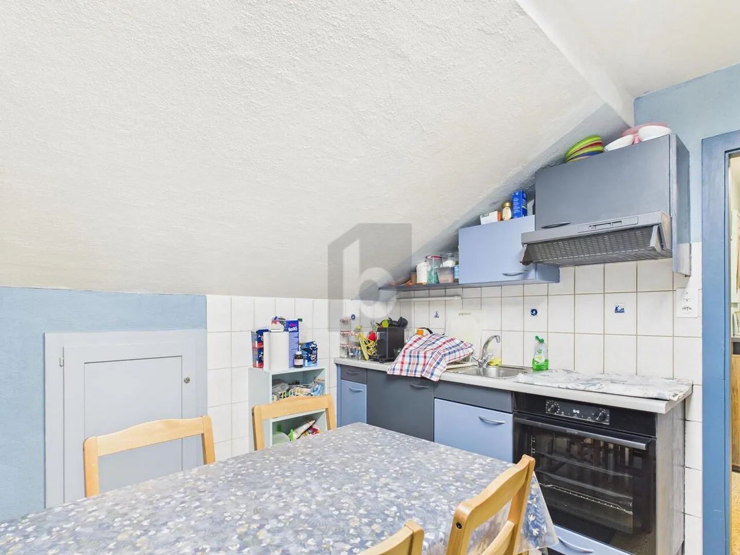 CHIC AND WELL-MAINTAINED LIVING SPACE ON TWO LEVELS - Photo 2 of 6