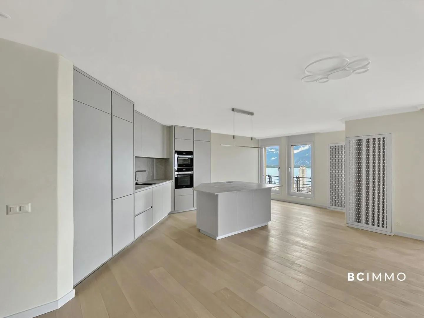 Appartement Contemporain avec Vue sur le Lac - Photo 4 sur 12