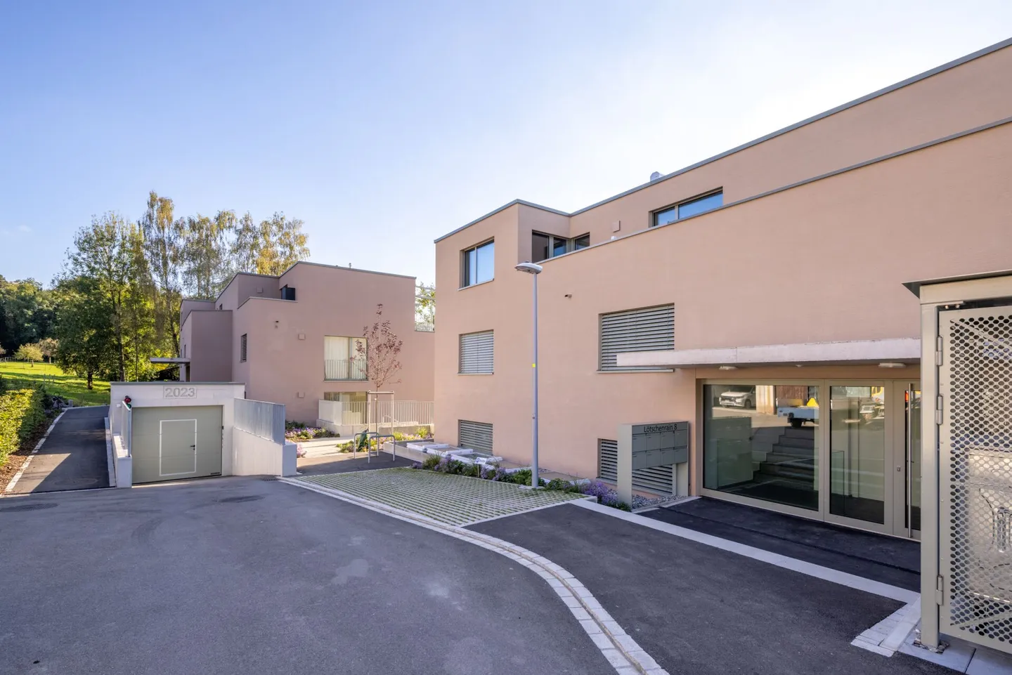 Posto auto in garage in un moderno nuovo edificio a Obfelden - Foto 1 di 5