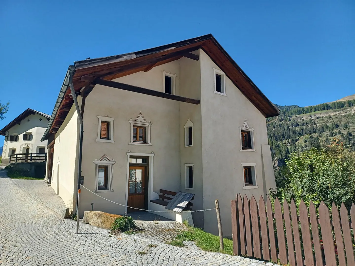 A Piece of Engadin History – Historical Residential House with Stable - Photo 1 of 11