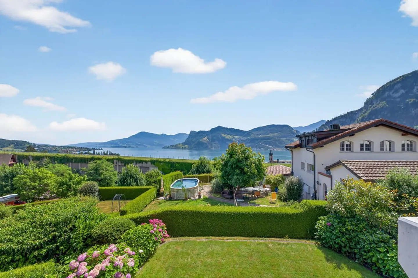 Panoramic Living Above Lake Lucerne - Enjoy Wonderful Living and Tax Benefits - Photo 1 of 13
