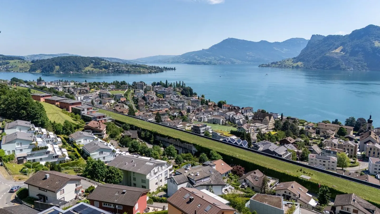 Panoramic Living Above Lake Lucerne - Enjoy Wonderful Living and Tax Benefits - Photo 2 of 13