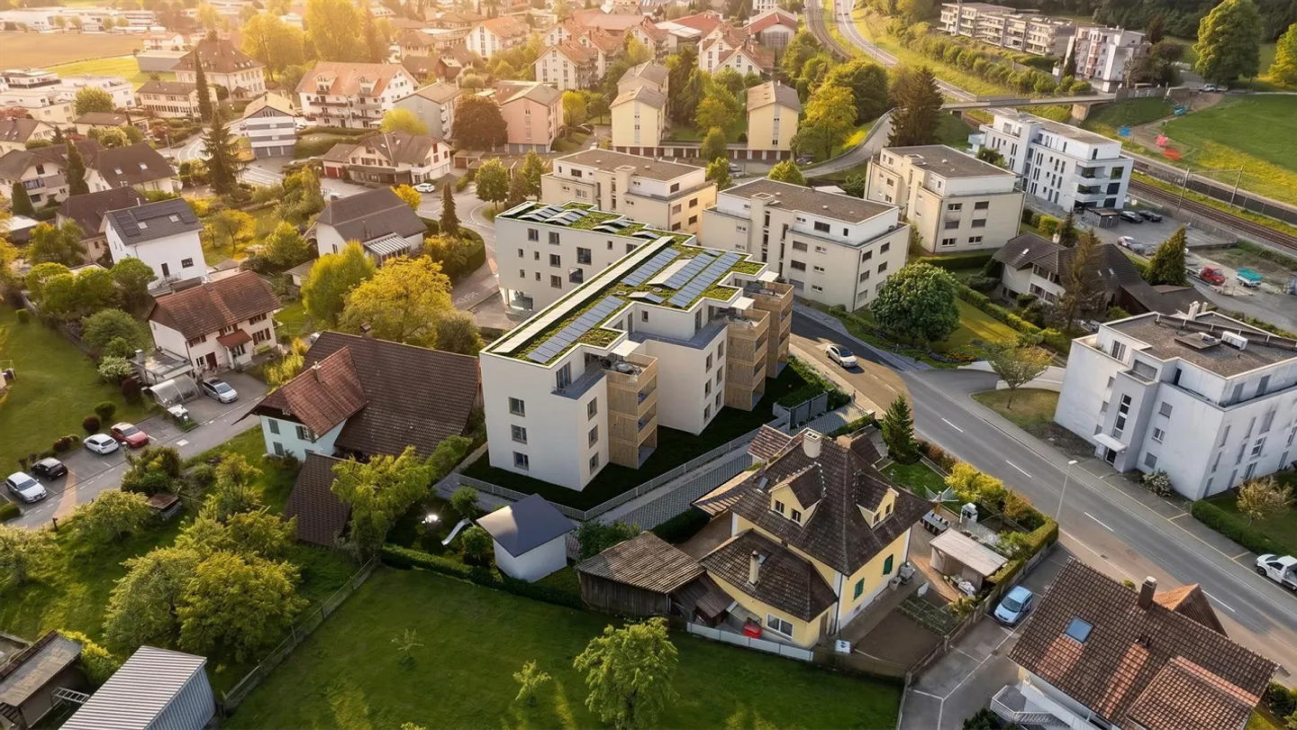Durchdachte Erdgeschosswohnung mit Gartensitzplatz und Rasenanteil - Photo 2 sur 4