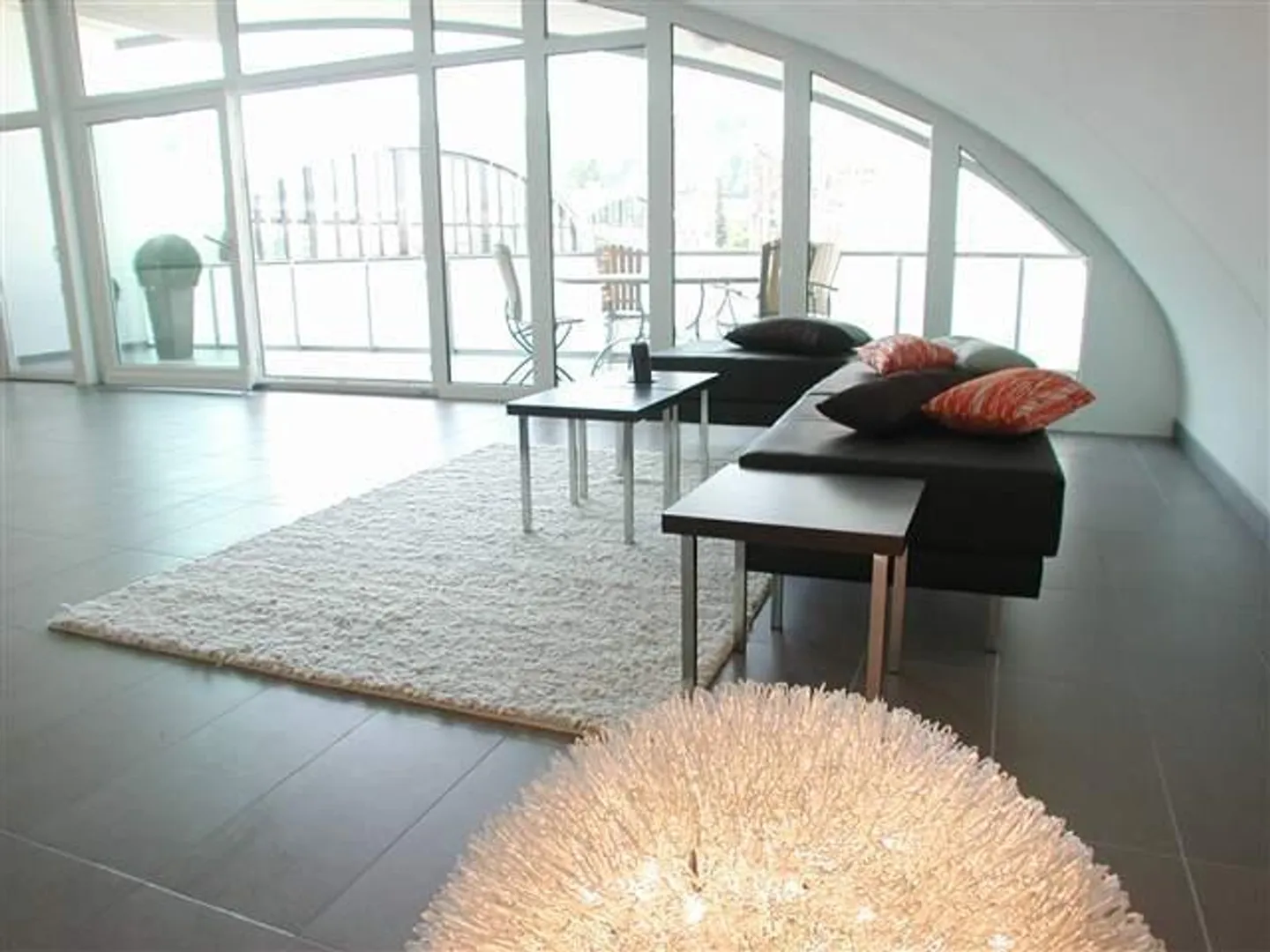 Dachwohnung mit grossem Balkon - Foto 1 von 10
