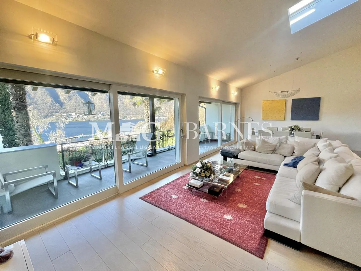 Morcote: Dachgeschoss-Penthouse 2.5 Zimmer mit Blick auf den Luganersee - Foto 1 von 13