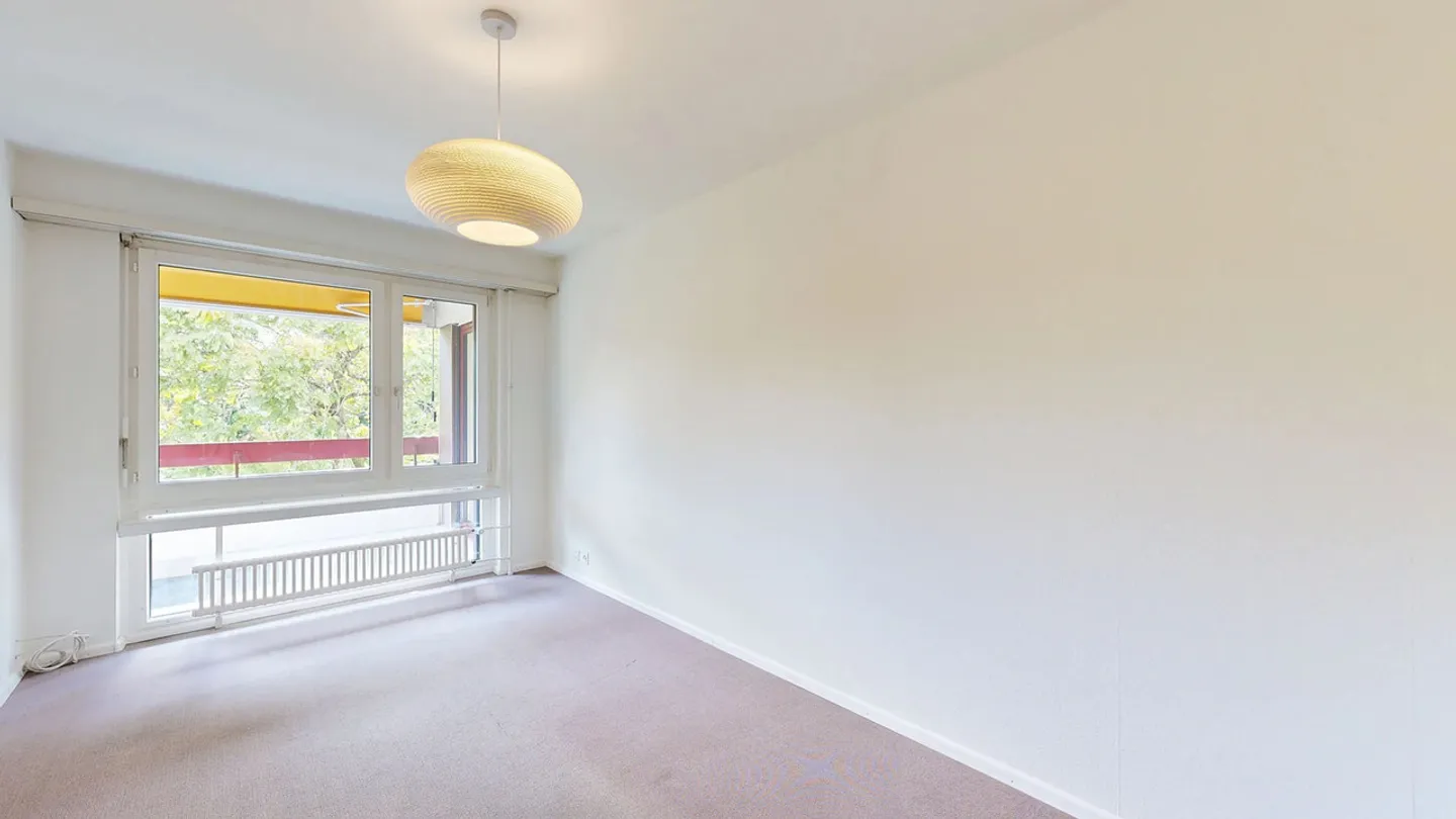 Cozy 4.5-room apartment in building rights with parking space - Photo 8 of 17