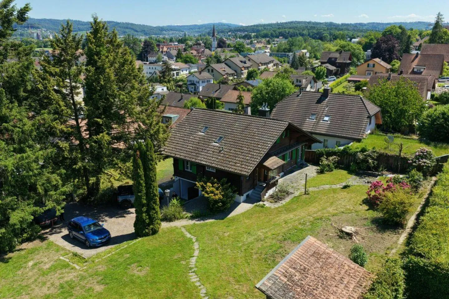 CHALET WITH CHARM, LOTS OF LAND AND GREAT POTENTIAL - Photo 1 of 13
