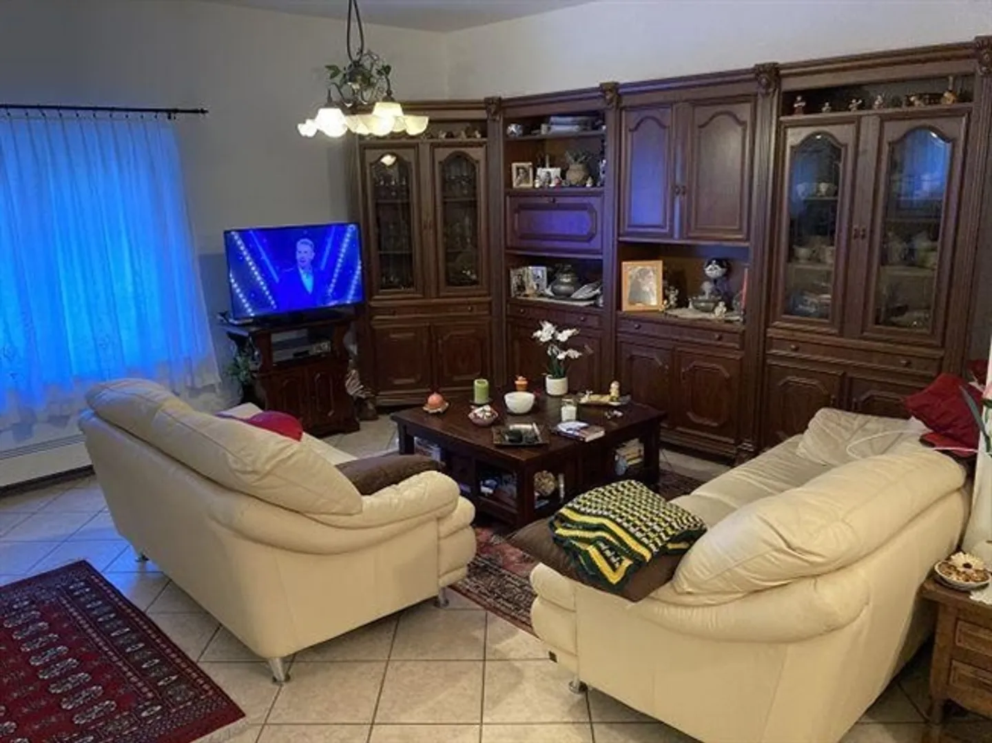 Maison bifamiliale avec appartements de 4 1/2 pièces et grand jardin/terrain à bâtir - Photo 16 sur 20