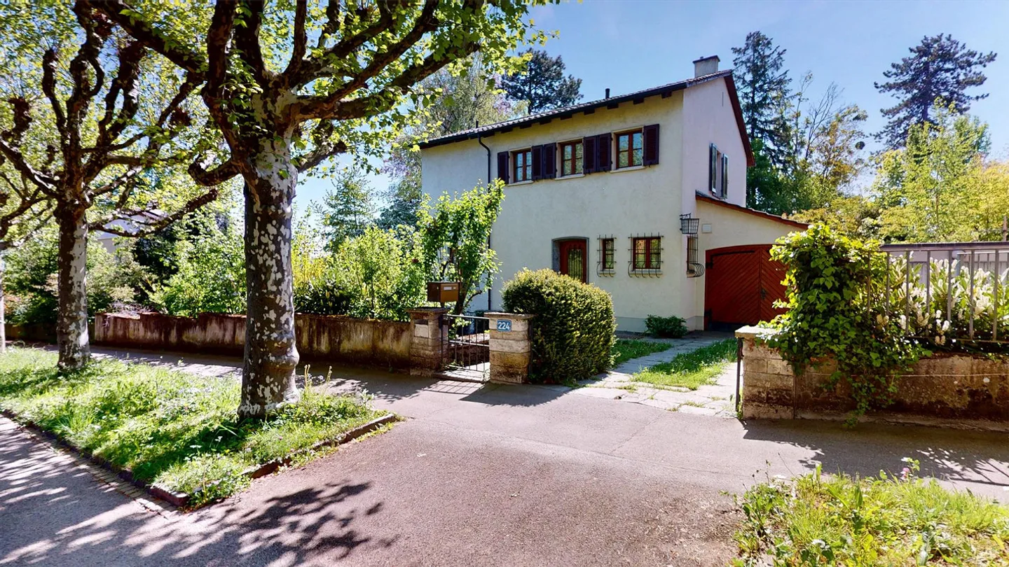 Charming single-family home with idyllic garden paradise in the sought-after Bruderholz district - Photo 1 of 13