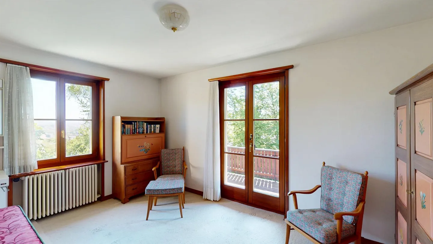 Charming single-family home with idyllic garden paradise in the sought-after Bruderholz district - Photo 9 of 13