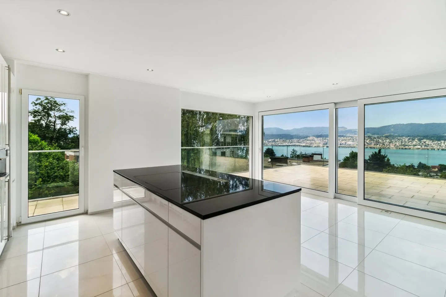 Appartement penthouse exclusif avec vue imprenable sur le lac de Zurich et cheminée - Photo 3 sur 10