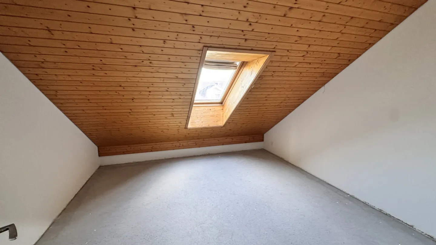 Appartement 3.5 pièces en attique dans un emplacement calme - Photo 8 sur 8