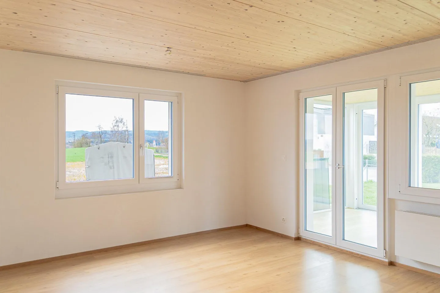 Idyllische 4.5-Zimmerwohnung mit Garten - Foto 6 von 17